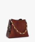 Buy Dark brown suede handbag with braided handle in Pakistan