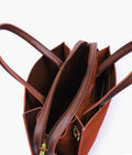 Buy Dark brown suede trapeze top-handle bag in Pakistan