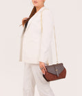 Buy Dark brown top-handle hexagon bag in Pakistan