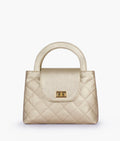 Buy Golden flap quilted bag with top handle in Pakistan