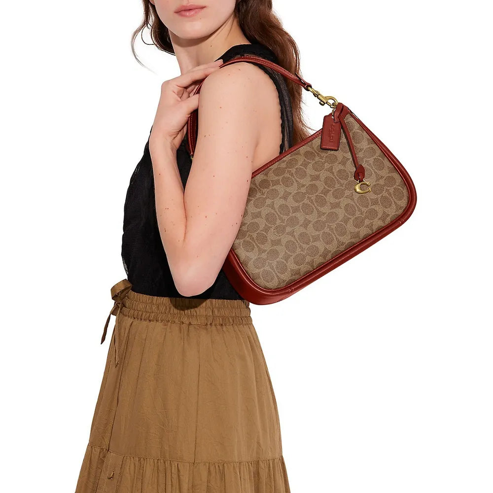 Buy Coach Cary Signature Canvas & Leather Crossbody Small Bag - Tan Rust in Pakistan