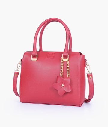 Buy Maroon handbag with flower charm in Pakistan