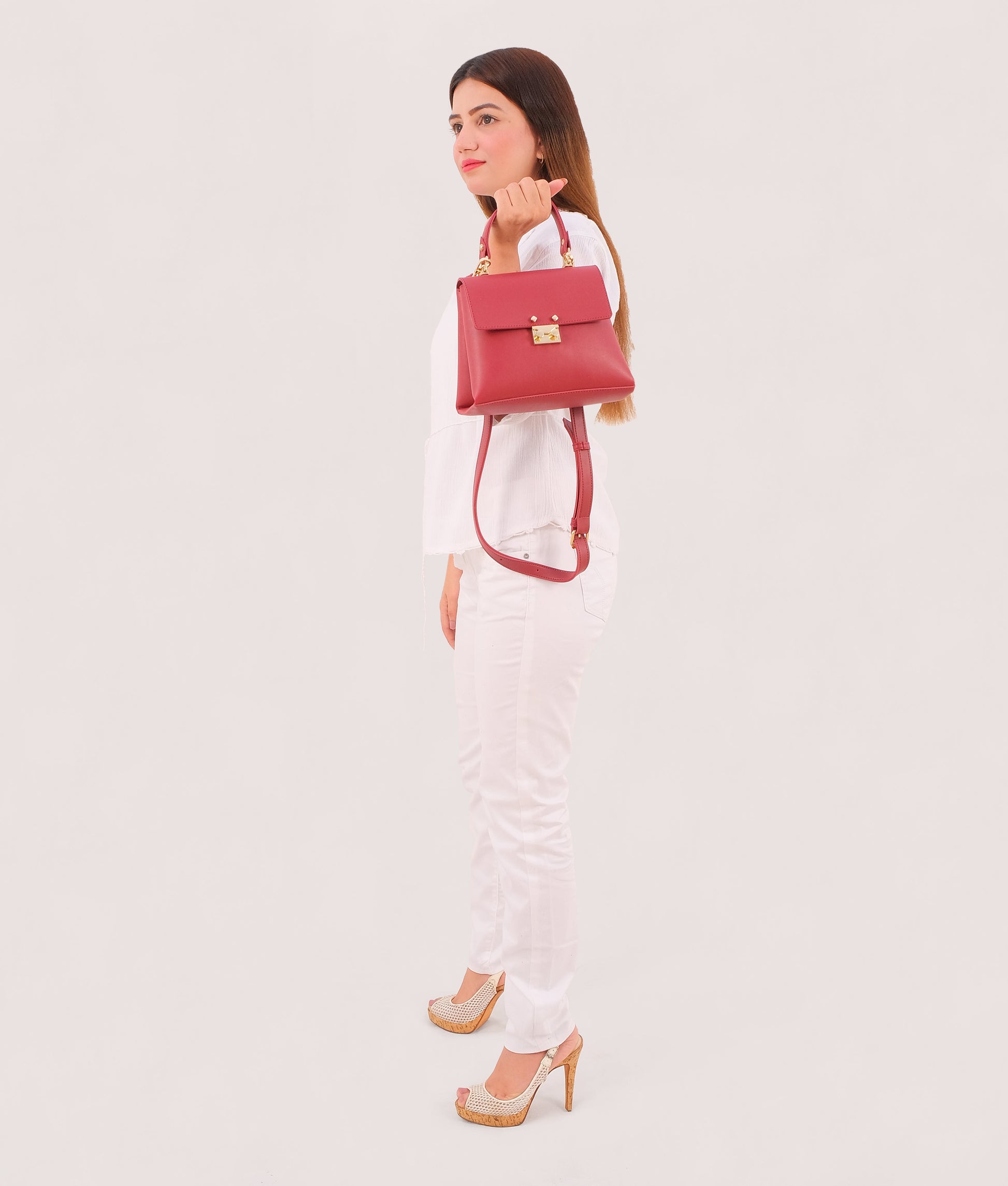 Buy Maroon mini top-handle bag in Pakistan