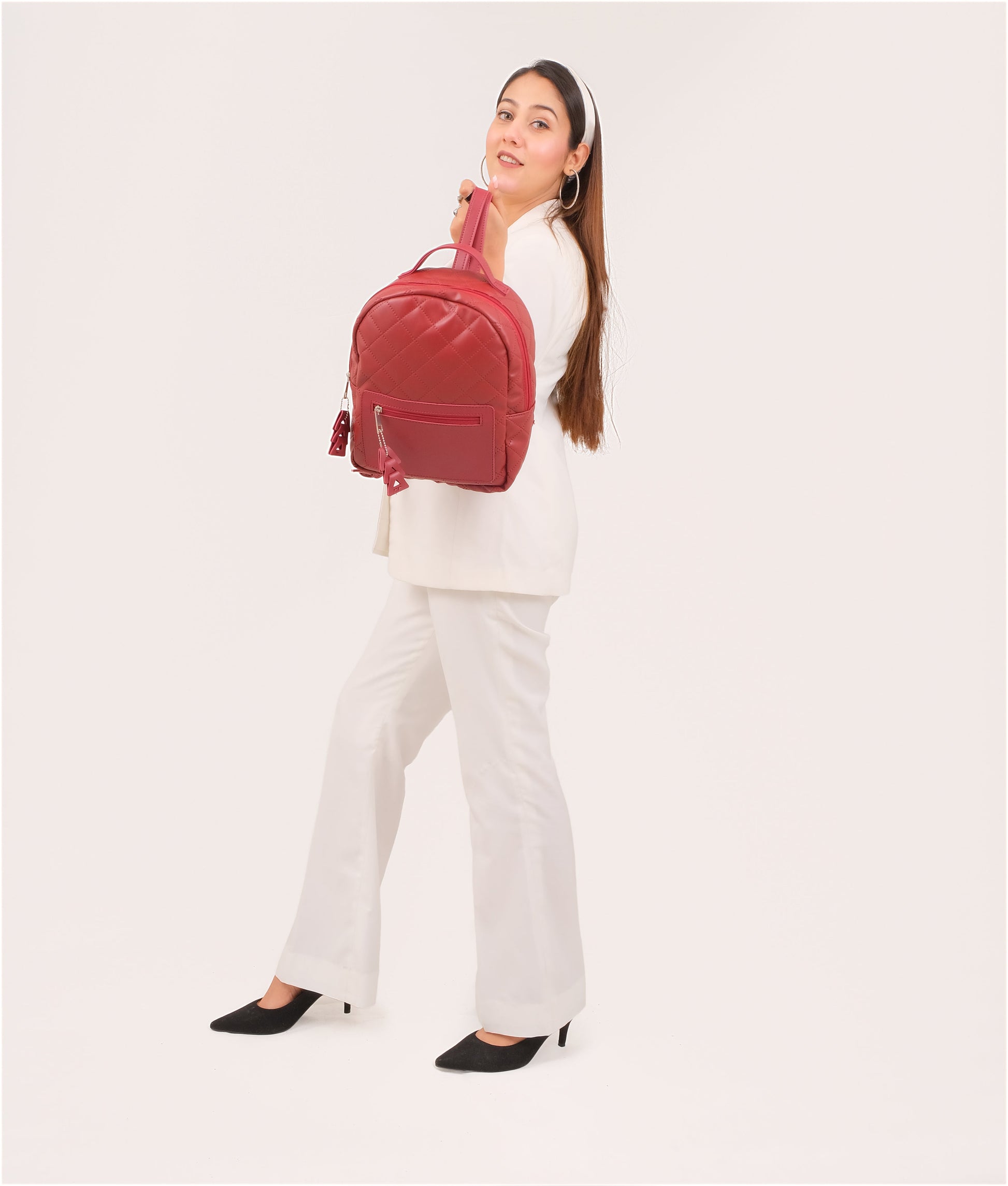 Buy Maroon quilted mini backpack in Pakistan