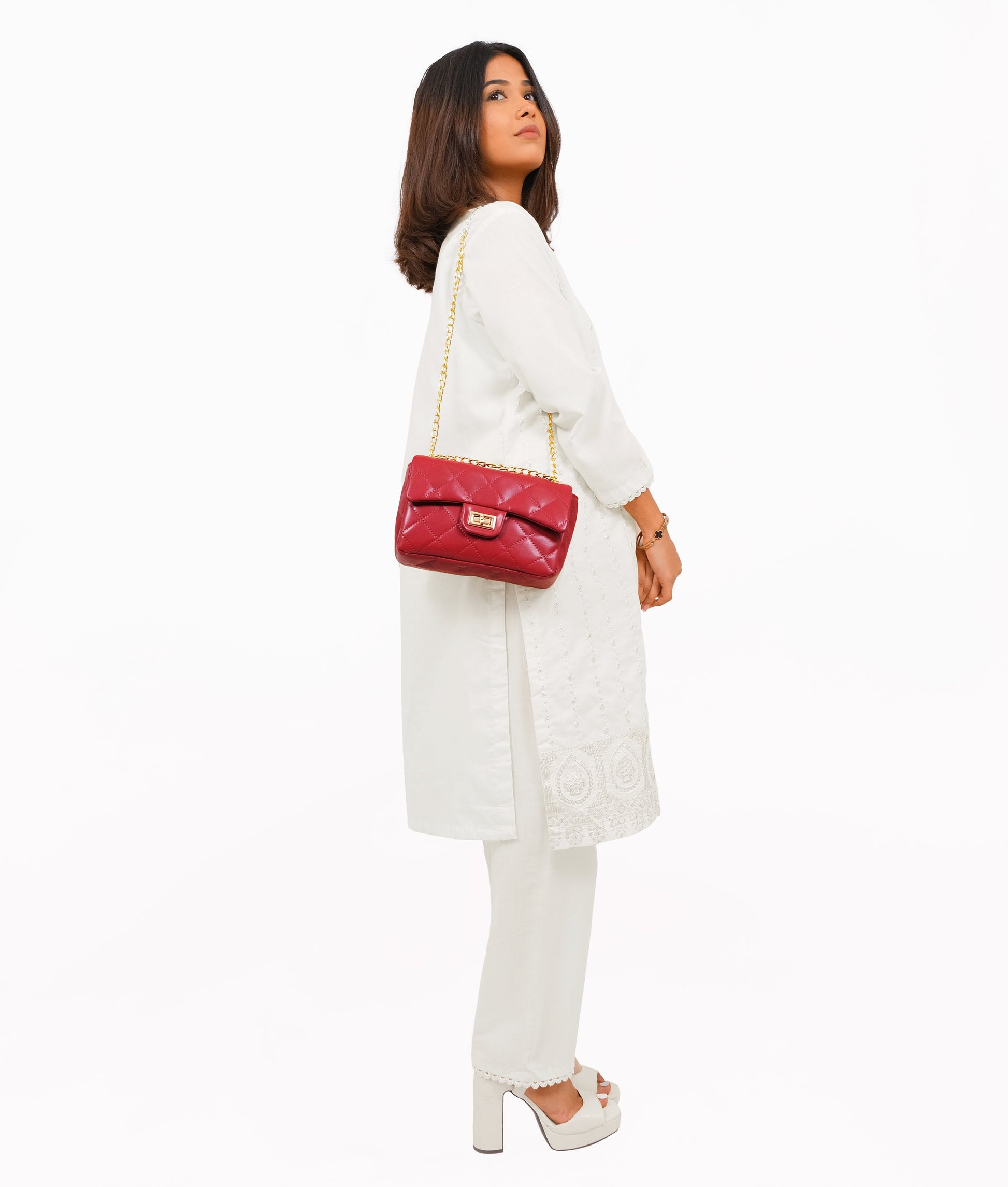 Buy Maroon quilted mini bag with chain in Pakistan