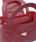 Buy Maroon flap quilted bag with top handle in Pakistan