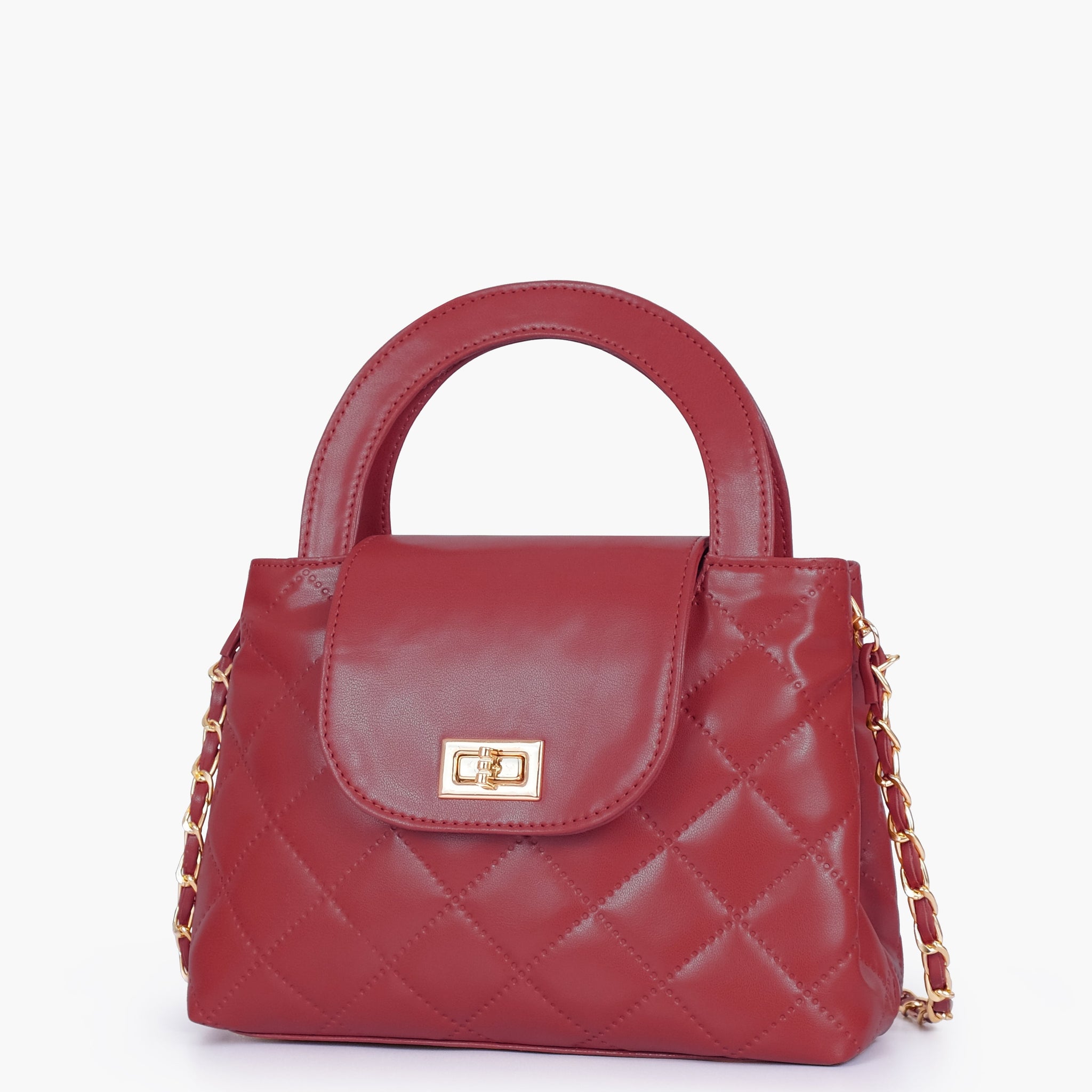 Buy Maroon flap quilted bag with top handle in Pakistan