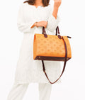 Buy Mustard and dark brown on-the-go handbag in Pakistan