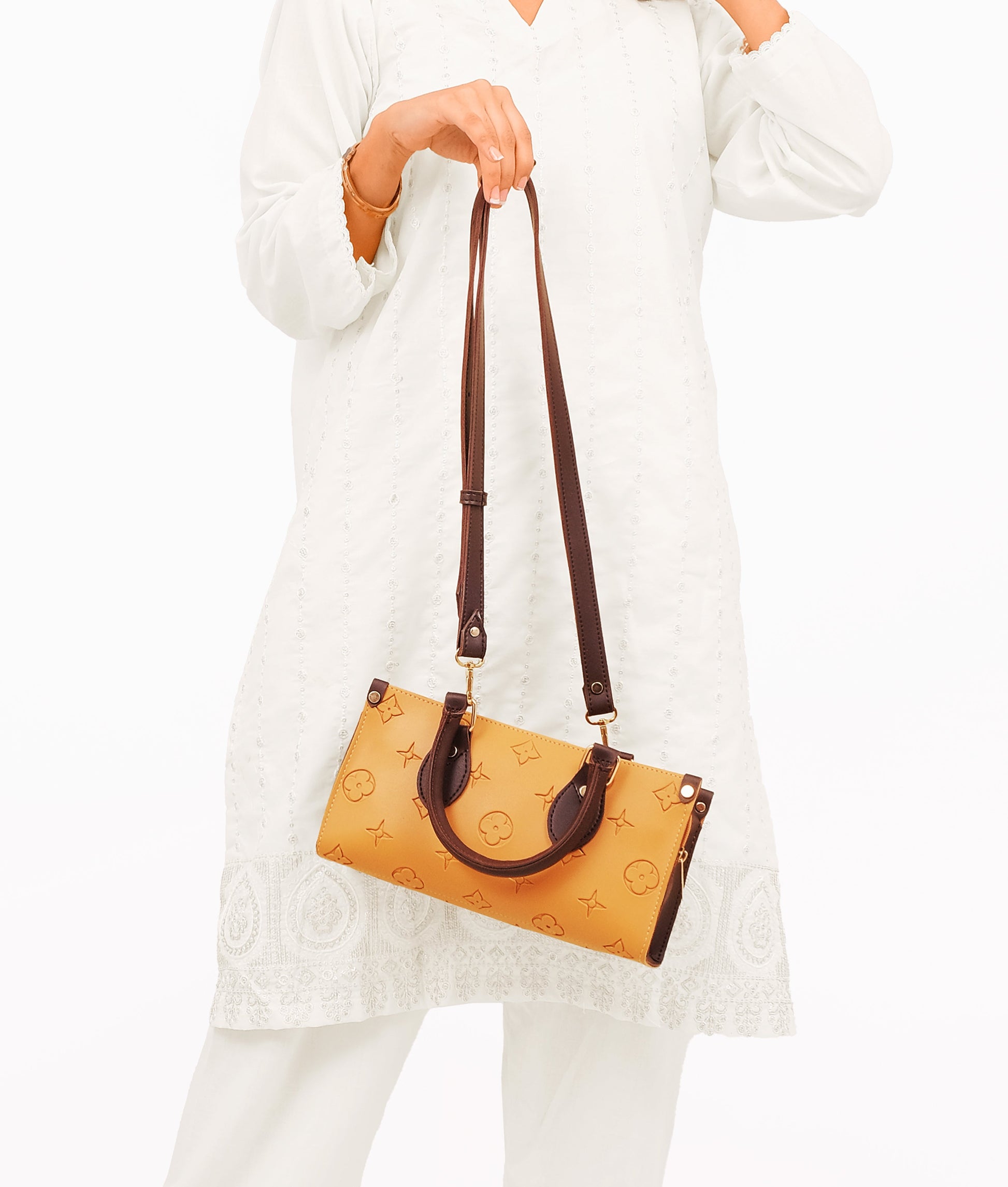 Buy Mustard and dark brown on-the-go mini bag in Pakistan