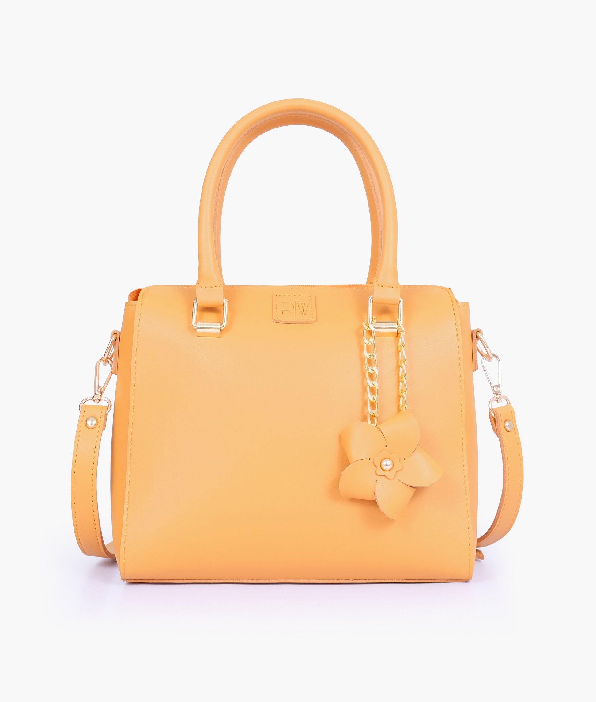 Buy Mustard handbag with flower charm in Pakistan