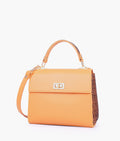 Buy Mustard criss-cross top-handle bag in Pakistan