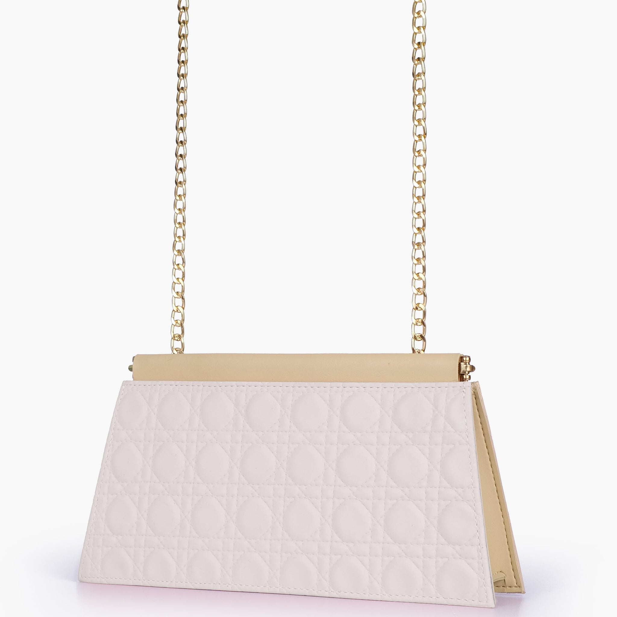 Buy Off-white quilted evening clutch with snap closure in Pakistan