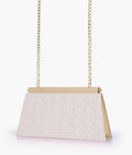 Buy Off-white quilted evening clutch with snap closure in Pakistan