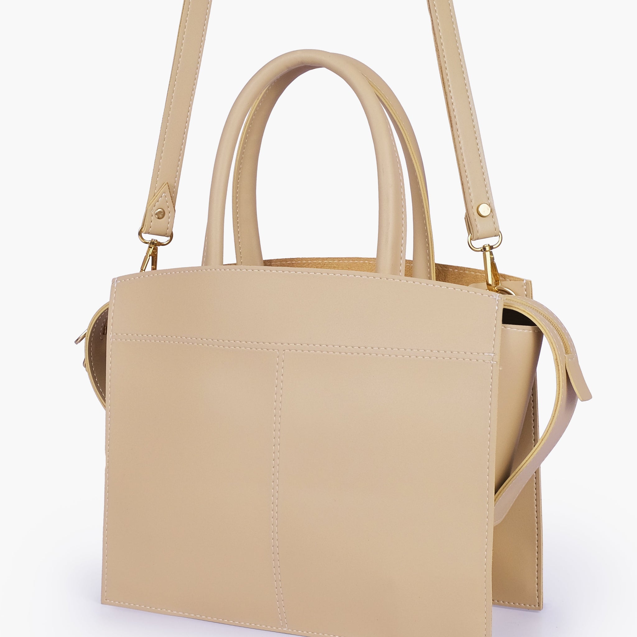 Buy Off-white trapeze top-handle bag in Pakistan