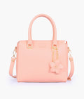 Buy Peach handbag with flower charm in Pakistan