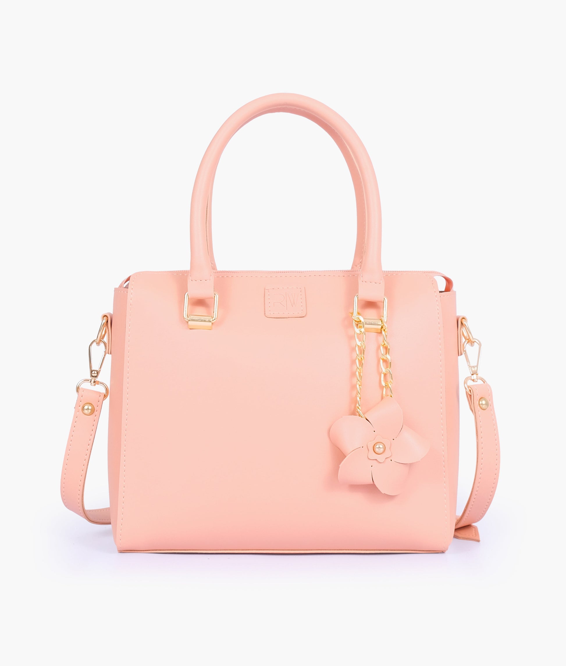 Buy Peach handbag with flower charm in Pakistan