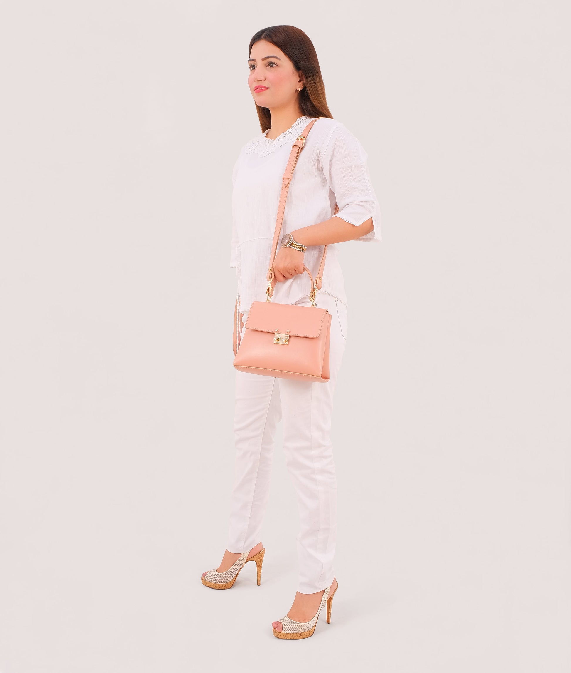 Buy Peach mini top-handle bag in Pakistan