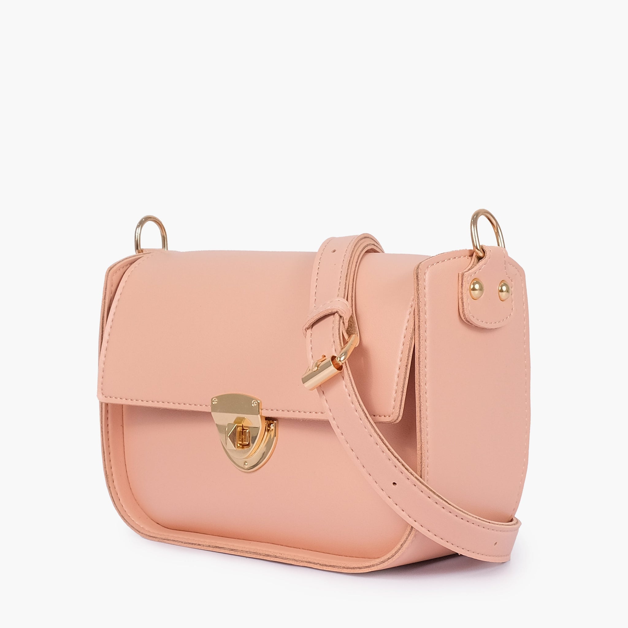 Buy Peach saddle bag with twist lock in Pakistan