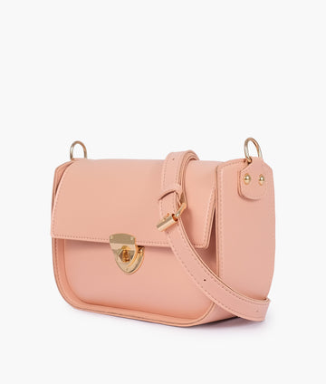 Buy Peach saddle bag with twist lock in Pakistan