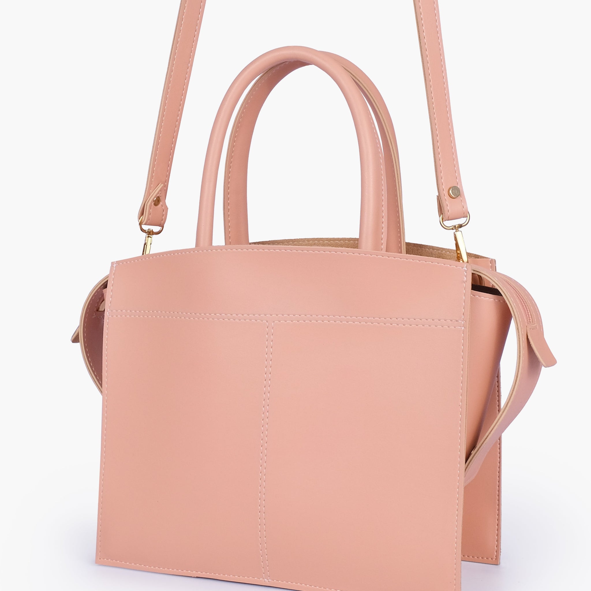 Buy Peach trapeze top-handle bag in Pakistan