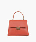 Buy Rust mini top-handle bag in Pakistan