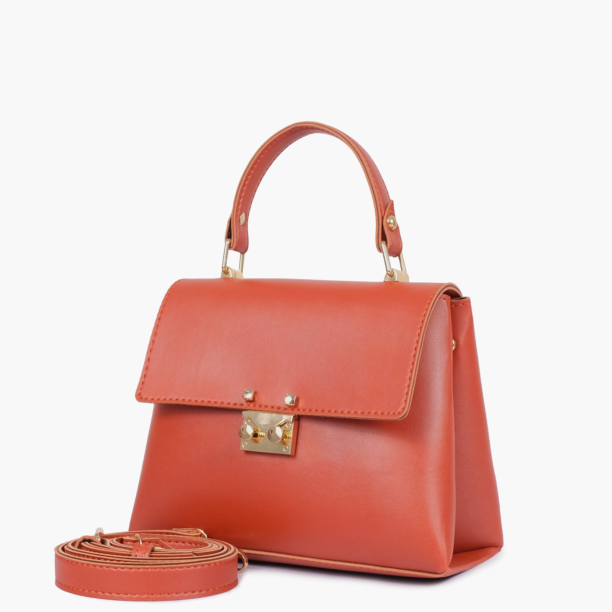 Buy Rust mini top-handle bag in Pakistan