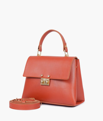 Buy Rust mini top-handle bag in Pakistan