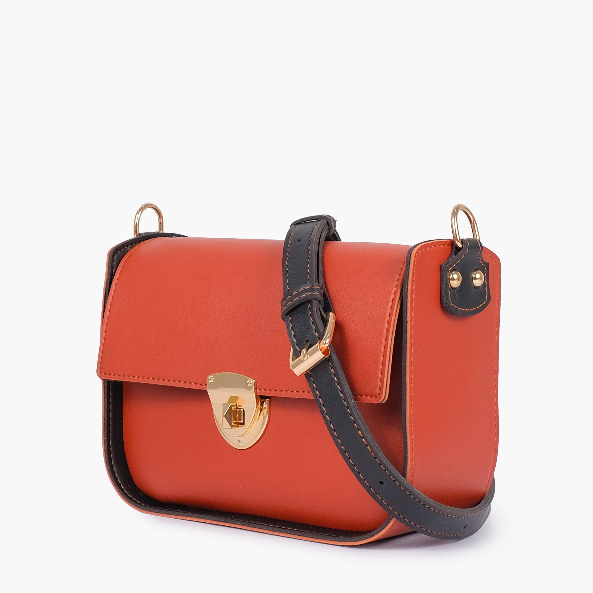 Buy Rust saddle bag with twist lock in Pakistan