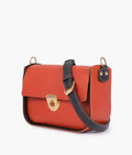 Buy Rust saddle bag with twist lock in Pakistan