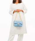 Buy Sky Blue quilted mini bag with chain in Pakistan