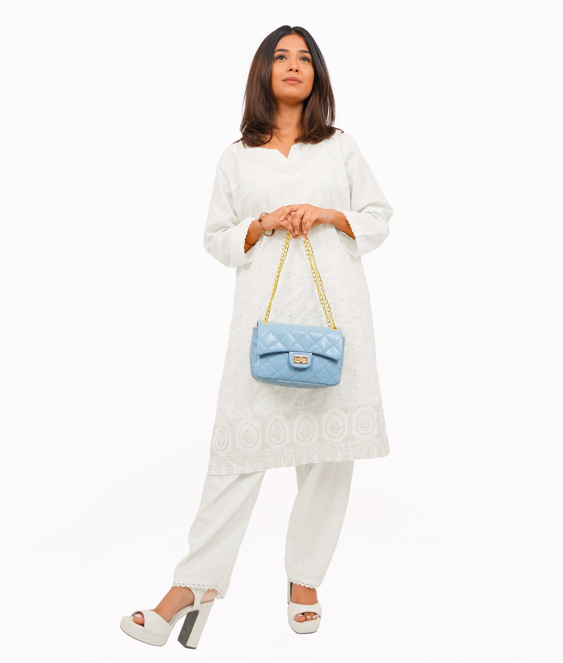 Buy Sky Blue quilted mini bag with chain in Pakistan