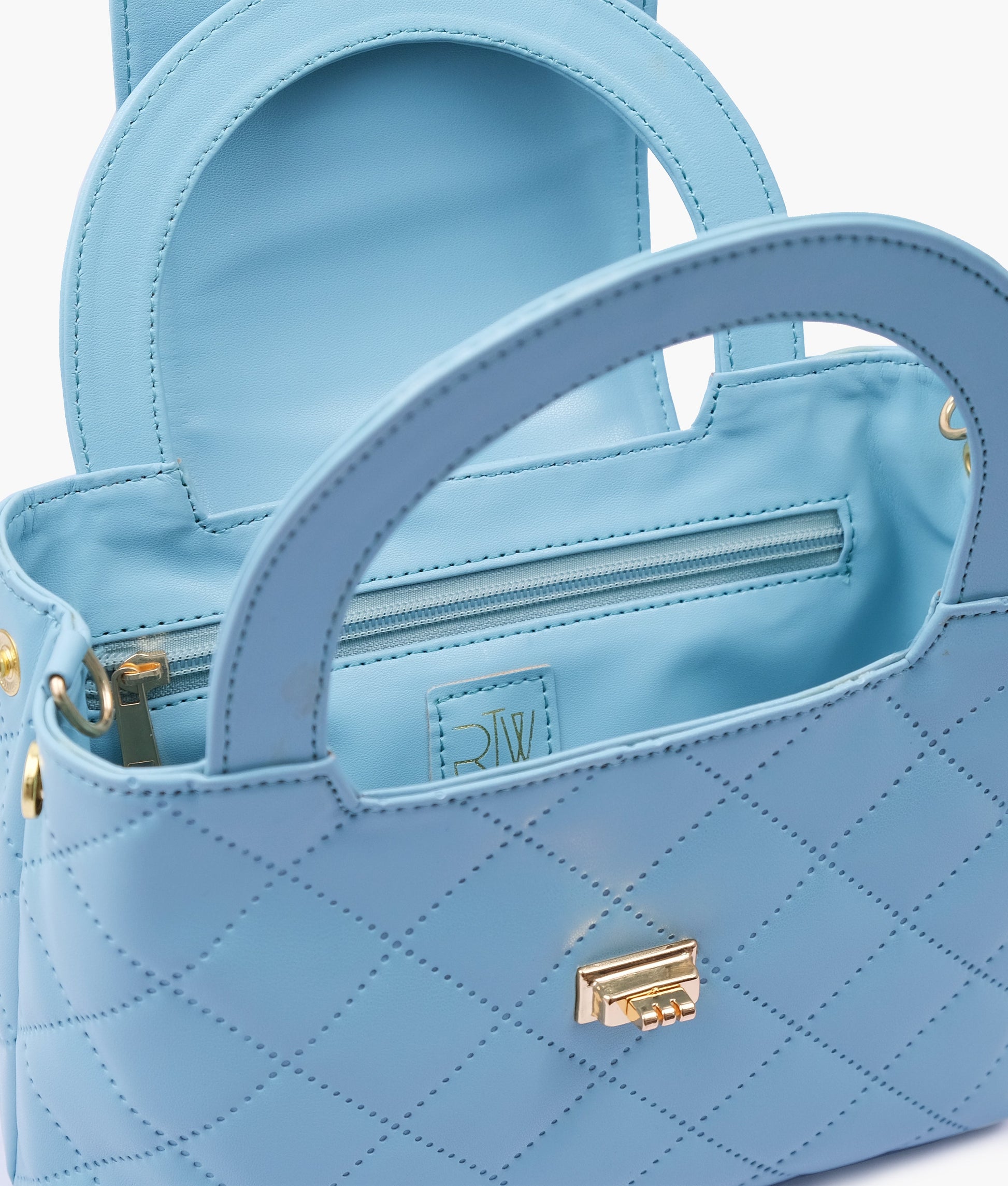 Buy Sky blue flap quilted bag with top handle in Pakistan