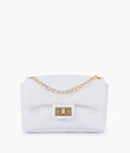 Buy White quilted mini bag with chain in Pakistan