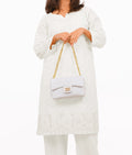 Buy White quilted mini bag with chain in Pakistan