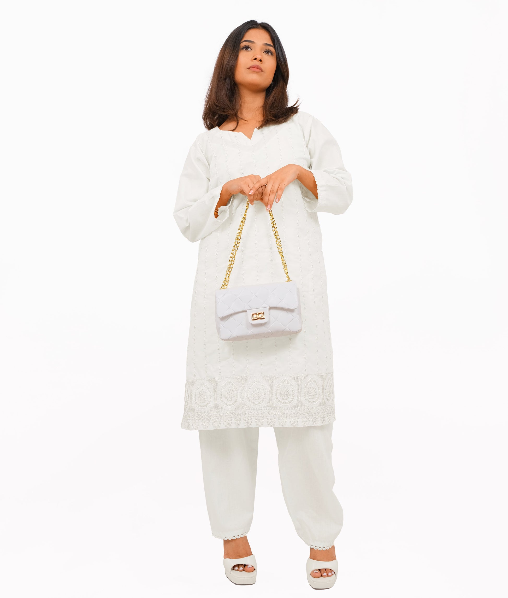 Buy White quilted mini bag with chain in Pakistan