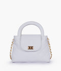 Buy White flap quilted bag with top handle in Pakistan