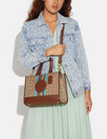 Buy Coach Dempsey Carryall In Signature Jacquard With Stripe And Coach Patch Bag Large in Pakistan