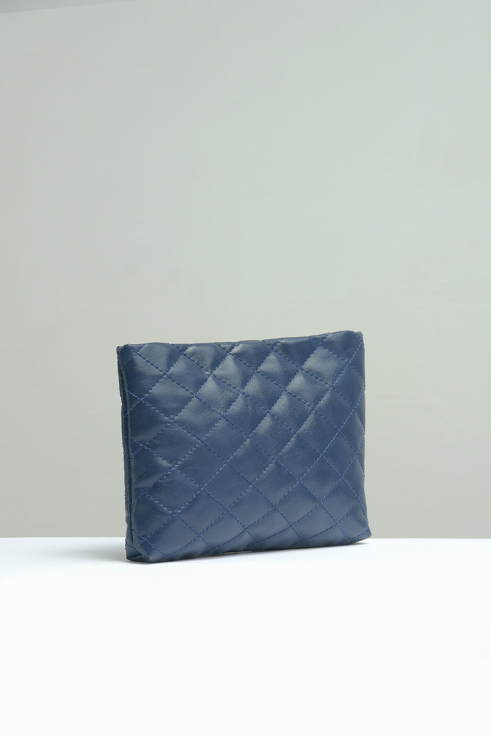 Buy Negative Apparel Small Quilted Embossed Pouch FD - Blue in Pakistan